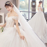 He Law Style Luxury Dream Tail Light Wedding Dress 2026 New Bridal White Shoulder Wedding Dress HZ0517