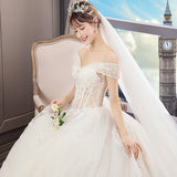 He Law Style Luxury Dream Tail Light Wedding Dress 2026 New Bridal White Shoulder Wedding Dress HZ0517