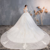 One-Word Shoulder Wedding Dress 2025 New Bridal Lace Court Luxury Sen Series Super Fairy Dream Wedding Dress Big Tail HZ0517