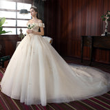 One-Word Shoulder Wedding Dress 2026 New Bridal Main Yarn French Style Tail Dream Simple Thin Spring Light Wedding Dress HZ0517