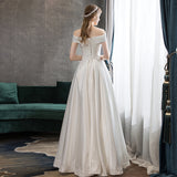 One-Word Shoulder-Sand-Faced Light Wedding Dress 2026 New Bride White Simple To Go Out Yarn Small Trip Wedding Dress HZ0517