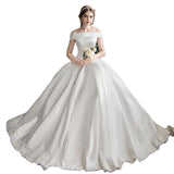 One-Word Shoulder-Sand-Faced Light Wedding Dress 2026 New Bride White Simple To Go Out Yarn Small Trip Wedding Dress HZ0517