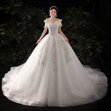 One-Word Shoulder Drag Tail Light Wedding Dress 2026 New Fashion Dream Wedding Dress Bridal Tied French Wedding Dress HZ0517