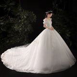 One-Word Shoulder Drag Tail Light Wedding Dress 2026 New Fashion Dream Wedding Dress Bridal Tied French Wedding Dress HZ0517
