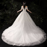 One-Word Shoulder Drag Tail Light Wedding Dress 2026 New Fashion Dream Wedding Dress Bridal Tied French Wedding Dress HZ0517