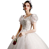 Wedding Dress 2025 New Bubble Sleeve Simple Temperament Starry Sky Dream Hepburn Style V-Neck Thin Tail Wedding Dress HZ0517