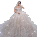 The Main Wedding Dress 2026 Spring New Bride A Word Shoulder Temperament Small Tailer Dream Super Fairy Go Out Yarn HZ0517