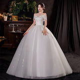 One-Word Shoulder Bridal Wedding Dress 2026 New Thin Temperament Wedding Main Yarn Big Pggy Poncho Tail Wedding Dress HZ0517