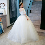 One-Word Shoulder French Light Main Wedding Dress 2026 New Bridal V Collar Small Man Dress Court Wind Yarn HZ0517