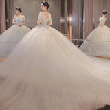 Light Wedding Dress 2026 New Word Shoulder Bridal Thin Short Sleeves Drag-Tailed Temperament Princess Mori Wedding Dress HZ0517