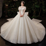 One-Word Shoulder French Light Wedding Dress 2026 New Temperament Big Tail Princess Style Bridal Dress Simple Atmosphere HZ0517