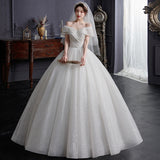 One-Word Shoulder Wedding Dress 2026 New Bride Tailed Temperament White Hebi-Style Small Man To Go Out Of The Sari System HZ0517