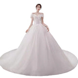 French Word Shoulder Main Wedding Dress 2026 Bride's New Court Wind Trip Film Wedding Dress Big Tail Wedding Dress HZ0517
