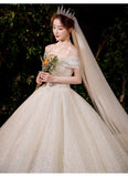 French Light Wedding Dress 2026 New Bridal Temperament Elegant Word Shoulder Repair Slim Large Tail Small Main Yarn HZ0517