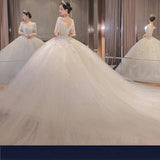 Light Wedding Dress 2026 New Word Shoulder Bridal Thin Short Sleeves Drag-Tailed Temperament Princess Mori Wedding Dress HZ0517