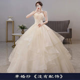 Light Wedding Dress 2026 New Breast-Meared Ponbo Skirt Super Fairy Champagne Dress Femininity Princess Femininity Princess Wedding Dress HZ0517