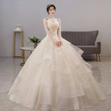 Light Wedding Dress 2026 New Breast-Meared Ponbo Skirt Super Fairy Champagne Dress Femininity Princess Femininity Princess Wedding Dress HZ0517