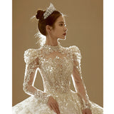 Long-Sleeved Wedding Dress 2026 New Bridal French Retro Light Luxury Niche High-End High-End High-End Travel Yarn Lady HZ0517