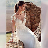 Wedding Dress 2026 New Hot Lace Dress French Paste Deep V-Neck Transparent Long-Sleeved Main Wedding Dress HZ0517