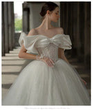 One-Word Shoulder Wedding Dress Bride 2026 New Temperament Main Yarn High-Quality Court Style French Large Tail Light Pregnant Woman HZ0517