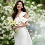 Light Wedding Trip Super Xian Sen 2026 New White Thin Bow Bow Outside To Take A Small Tail Dress Skirt HZ0517