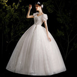 Wedding Dress 2025 New Bubble Sleeve Simple Temperament Starry Sky Dream Hepburn Style V-Neck Thin Tail Wedding Dress HZ0517