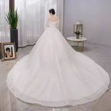 French Word Shoulder Main Wedding Dress 2026 Bride's New Court Wind Trip Film Wedding Dress Big Tail Wedding Dress HZ0517