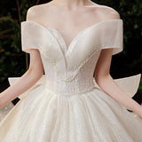One-Word Shoulder French Light Wedding Dress 2026 New Temperament Big Tail Princess Style Bridal Dress Simple Atmosphere HZ0517