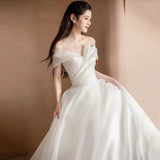 One-Word Shoulder Light Wedding Bride 2026 New Travel Photography Sen Series Super Fairy Dress Simple Light Luxury Welcome Go Out Yarn HZ0517