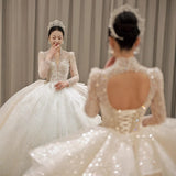 Long-Sleeved Wedding Dress 2026 New Bridal Heavy Industry Big Tail French Small Starry Sky Deep V Court Style Wedding Dress HZ0517