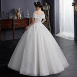 One-Word Shoulder Wedding Dress 2026 New Bride Tailed Temperament White Hebi-Style Small Man To Go Out Of The Sari System HZ0517