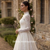 French Lace Wedding Dress 2026 New Bridal Atmosphere Simple High-End Long-Sleeved Summer To Go Out To Welcome The Yarn Small Tail HZ0517