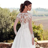 Wedding Dress 2026 New Hot Lace Dress French Paste Deep V-Neck Transparent Long-Sleeved Main Wedding Dress HZ0517