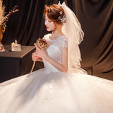 One-Word Shoulder Wedding Dress 2026 New Temperament Bride Simple Atmospheric Princess Dress With Thin And Light Wedding Dress HZ0517