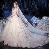 One-Word Shoulder Wedding Dress 2026 New Temperament Bride Simple Atmospheric Princess Dress Small Tug Tail Thin Wedding Dress HZ0517