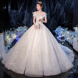 One-Word Shoulder Wedding Dress 2026 New Temperament Bride Simple Atmospheric Princess Dress Small Tug Tail Thin Wedding Dress HZ0517