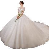 One-Word Shoulder-To-Shoulder Wedding Dress 2026 New Main Yarn Bride Spring French Female Drag Tail Court Wind Trip Wedding Dress HZ0517