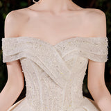 French Light Wedding Dress 2026 New Bridal Temperament Elegant Word Shoulder Repair Slim Large Tail Small Main Yarn HZ0517