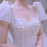Main Wedding Dress 2026 New Bridal Starry Sky French Tail White Shoulder Bubble Sleeves To Cover The Dignified Atmosphere Of The Arm HZ0517