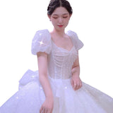 Main Wedding Dress 2026 New Bridal Starry Sky French Tail White Shoulder Bubble Sleeves To Cover The Dignified Atmosphere Of The Arm HZ0517
