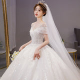 One-Word Shoulder-To-Shoulder Wedding Dress 2026 New Main Yarn Bride Spring French Female Drag Tail Court Wind Trip Wedding Dress HZ0517