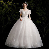 Wedding Dress 2025 New Bubble Sleeve Simple Temperament Starry Sky Dream Hepburn Style V-Neck Thin Tail Wedding Dress HZ0517