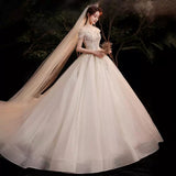 One-Word Shoulder French Main Wedding Dress 2025 New Spring And Summer Bridal Court Wind Small Heavy Industry Big Tail HZ0517