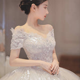 Light Wedding Dress 2026 New Word Shoulder Bridal Thin Short Sleeves Drag-Tailed Temperament Princess Mori Wedding Dress HZ0517