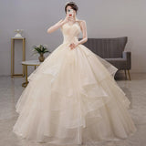 Light Wedding Dress 2026 New Breast-Meared Ponbo Skirt Super Fairy Champagne Dress Femininity Princess Femininity Princess Wedding Dress HZ0517