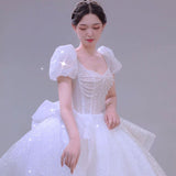 Main Wedding Dress 2026 New Bridal Starry Sky French Tail White Shoulder Bubble Sleeves To Cover The Dignified Atmosphere Of The Arm HZ0517