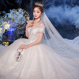 One-Word Shoulder Wedding Dress 2026 New Temperament Bride Simple Atmospheric Princess Dress Small Tug Tail Thin Wedding Dress HZ0517