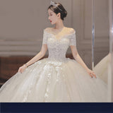 Light Wedding Dress 2026 New Word Shoulder Bridal Thin Short Sleeves Drag-Tailed Temperament Princess Mori Wedding Dress HZ0517