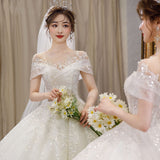 One-Word Shoulder-To-Shoulder Wedding Dress 2026 New Main Yarn Bride Spring French Female Drag Tail Court Wind Trip Wedding Dress HZ0517