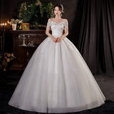 One-Word Shoulder Bridal Wedding Dress 2026 New Thin Temperament Wedding Main Yarn Big Pggy Poncho Tail Wedding Dress HZ0517